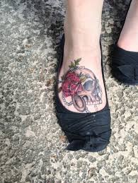 Bud of rose skull tattoos. 50 Magnificent Skull Tattoos On Foot