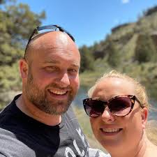 The top of Mount Hood casts a shadow