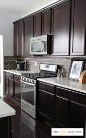 Modern brown white kitchen cabinets dark countertop. Dark Tile Light Grout Kitchen Backsplash Backsplash With Dark Cabinets Home Kitchens Kitchen Renovation