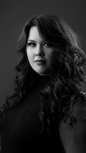 Hi there! I'm Julianna Harpe, owner of Curls & Cuts Beauty Bar in small  town St. Marys, KS. For those who don't know me, here's a little about the  person behind the