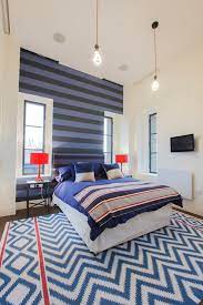 Hang custom printed wall décor, bright colored wall decals, or if you or your child is artistically gifted incorporate their own art pieces. Eye Catching Wall Decor Ideas For Teen Boy Bedrooms