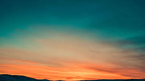 Sunset sky with orange clouds background. 125 Captions For A Beautiful Sunset