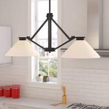 While pendant lighting does supply direct lighting over and island, sometimes it can be more decorative if there is a good wash of light surrounding the space. Ebern Designs Naccarato 2 Light Kitchen Island Linear Pendant Reviews Wayfair