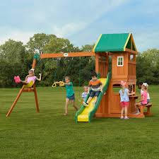 This is a super cool set that has swings, an alpine wave slide™, a trapeze swing and even a rock climbing wall! Wooden Swing Sets Playhouses Playsets Backyard Discovery