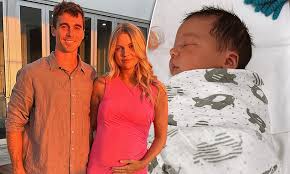 AFL star Jamie Cripps and his model wife Liv welcome miracle baby