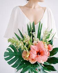Many varieties are colorful, fragrant, and beautiful. 20 Tropical Leaf Wedding Bouquets Hibiscus Wedding Choosing Wedding Colors Beach Wedding Bouquets