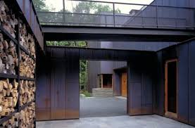 A Copper Clad Modernist Gem In The Big Woods Gardenista Outdoor Wood Small Courtyards Architect