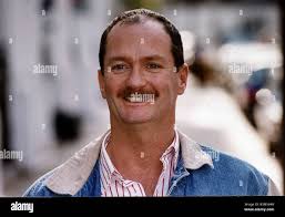 Kenny Everett DJ TV Presenter and Comedian announcing that he is HIV  positive Stock Photo