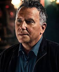 Nat Faxon as Russ Bowman