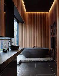 Here, light warm tones offset the dark chocolate feature wall, the curved bathtub and basins balance the sharp, strong lines of the vanity, and the wooden ladder, sculptural pendant light and floral motif breathe life into. Pin On Modern Japanese Residence