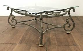 This coffee table features a live edge acacia wood tabletop in a brown finish and sits on top of a strong black iron base. Sold Price Rustic Traditional Wrought Iron Coffee Table March 6 0121 10 00 Am Mst