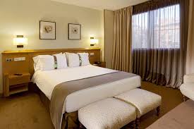 If you drive, self parking is eur 20.90 per night, and there's also an area shuttle for a fee. Holiday Inn Madrid Piramides Hlx