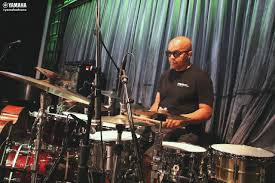 Marcus Baylor having fun at soundcheck performing with Kenny Garrett.  Marcus plays Yamaha Absolute Hybrid Maple in Classic Walnut finish and new  14" x 7" Recording Custom Stainless Steel Snare (RLS1470), 13"