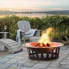 Propane fire pits are powered by a liquid propane tank which is often stored in a drawer or closet. Paris Bistro Collection In 2020 Copper Fire Pit Fire Pit Landscaping Outdoor Fire