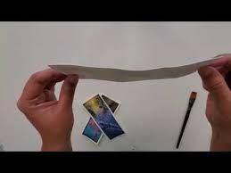 Let the paper sit in the smaller container without the plastic wrap for about 10 minutes to let the air hit it. How To Flatten Buckled Watercolor Paper How To Remove Buckles From A Painting Youtube