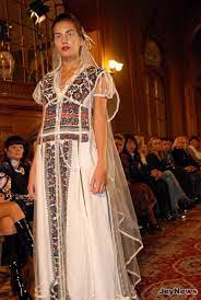 Along with the traditional dress, the bride wears pounds of beads with different colors. Pin By Jevel Wedding Planning Jen On Traditions Ukrainian Dress Ukrainian Wedding Traditional Fashion