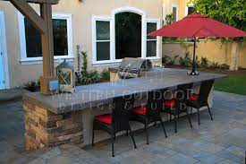 Yinyang/getty images in this slide, plants serve the purpose of breaking up a large patio, visually. Pin On Bbq Islands Western Outdoor Designs