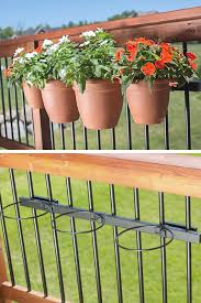 A deck fence with curtain of vegetation along the top rail is a vibrant border. Container Garden Kit With 36 Mounting Rail Patio Planters Balcony Planters Deck Railing Planters