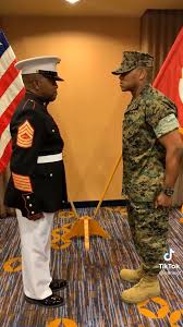 Marine father giving emotional first salute to son as commissioned officer  goes viral