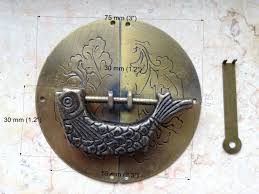 The activator pushes the bolt on the latch to the. One Set Of Cabinet Door Latcheshalf Piece Round Door Hasp Etsy Round Door Door Latch Cabinet Doors