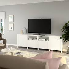 Besta Tv Unit With Doors And Drawers White Hanviken Stubbarp White 94 1 2x16 1 2x29 1 8 Shop Online Or In Store Ikea In 2020 Ikea Tv Tv Bench Tv Unit