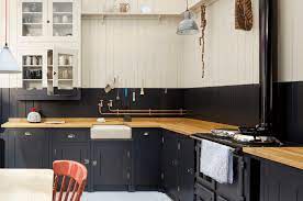 While a black island is the most popular way to go, you can test the black kitchen cabinet idea waters with a pantry, or by lining one accent wall with ebony cupboards like designer. 31 Black Kitchen Ideas For The Bold Modern Home