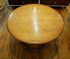 The furniture the company is best known for today are the pieces made. Heywood Wakefield Lazy Susan Round Coffee Table Circa