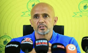 Not only was Juan Kermode a good manager of Ladies Teams he was in charge  of Castletown as well. This was a Hospital Cup I think Team who made the  Final, but