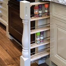 A pullout spice rack is a narrow shelf that includes a rail system mounted to a cabinet front. Hidden Spice Rack Houzz