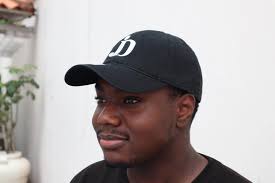 Regular Hat in white and black Price:$4500 JMD Dry Fit Hats in pink and  light green Price:$4500 JMD