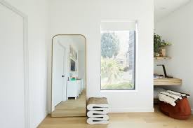 A small boho bedroom with a green wall, a pallet bed, a gallery wall, some lamps and potted greenery and catchy textiles. Best 60 Modern Bedroom Shelves Design Photos And Ideas Dwell