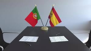 Spain and portugal are both so incredible, it can be tough to choose which to visit. Flags Of Portugal And Spain And Papers On The Table By Moovstock Videohive