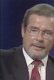 Roger Moore looking very beautiful with a beard.
