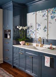 Since tiles are a lot cheaper to do than cabinets, this is a great budget friendly option for those looking for a quick remodel. Should I Paint My Cabinets Two Different Colors Paper Moon Painting