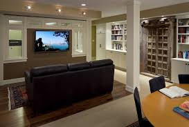 Start with decluttering the space and adding a large rug. Boston Workout Room Ideas Basement Victorian With Bookcase Traditional Household Cleaning Products Oriental Rug