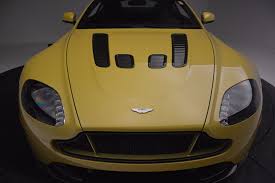 Image result for Sunburst Yellow 2017 Aston Martin