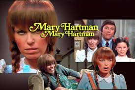 Mary Hartman, Mary Hartman" (1976-77) was a soap opera produced by Norman  Lear as a satire of the impact of American consumerism. The show's title  was stated twice, because Lear believed that