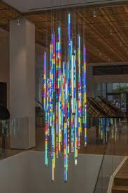 Chandelier lighting also hangs from the ceiling but features a branched system with many lights as opposed to one light like pendants. 580 001 Suspended Art Installations Ideas In 2021 Suspended Art Lighting Design Installation Art