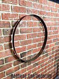 Wine barrel ring wall decor. Whiskey Barrel Hoop Fall Wreath Redhead Can Decorate