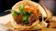 Bizarre Foods Delicious Destinations Andrew Zimmern Digs Into The Not To Be Missed Legendary Foods That Define A Location Bizarre Foods Food Delicious Destinations