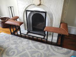 Tall steel fireplace screens with doors hold firmly to the hearth ground, even for outdoor fire pit, portico fireplace areas. Hand Made Fireplace Screens And Club Fender Benches By Old English Fireplace Benches Custommade Com