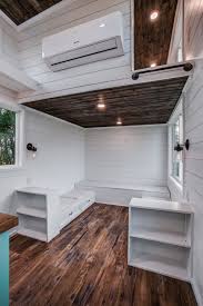 The outside has cedar shakes and vertical tongue and furrow favoring metal material. Magnolia By Indigo River Tiny Homes Tiny House Vacation Modern Tiny House Tiny House Movement