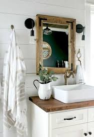 Doing this will not only infuse warmth into the space, but add a little bit of bonus storage for extra toilet paper rolls or hand towels. 80 Modern Farmhouse Bathroom Decor Ideas Decorapartment Modern Farmhouse Bathroom Bathroom Decor Farmhouse Bathroom Vanity