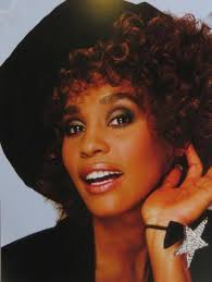 An early official publicity photo of Whitney from the 80s.