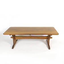 Y shaped live edge coffee table with modern black oxidized steel base. A Chapman Taylor Rimu Coffee Table Of Oblong Shape With Cut New Zealand Furniture Post 1950