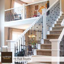 This Elegant Staircase Is Perfect For Your Grand Entrance Candlelighthomes Staircase Design Stair Railing Makeover Stair Railing Design