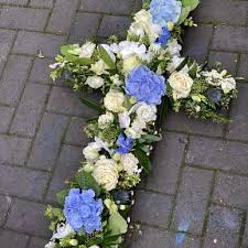 Orchid cross £150 1 size option. Cross Tributes Funeral Sympathy Flowers From Springfield Florist Of Chelmsford Essex Chelmsford Florist Sympathy Bouquets Sprays Crosses Coffin Sprays And Wreaths