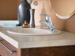 Set new top on cabinet and check level. How To Install A Bathroom Faucet In A Vanity Top