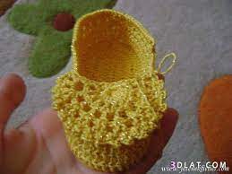 حذاء كروشية للاطفال طريقة عمل لكلوك للطفل بالصور اشغال يدوية crochet boots crochet earrings crochet