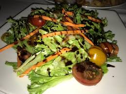 Anything with the garlic butter sauce, fish tacos and the grilled zucchini. Crab Cake Calamari And Fish Tacos Picture Of Eddie V S Prime Seafood Troy Tripadvisor